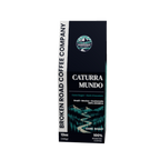 A single box of Broken Road Coffee Company Caturra Mundo dark roast coffee, shown against a plain white background.