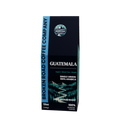 A 12oz bag of Broken Road Coffee Company Guatemala single origin coffee, featuring a dark navy blue package with a scenic mountain illustration and white text, set against a plain white background.