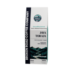A 12oz box of Broken Road Coffee Company Java Toraja Decaffeinated coffee, featuring a white and black package design with a dark chocolate and herbal flavor label.