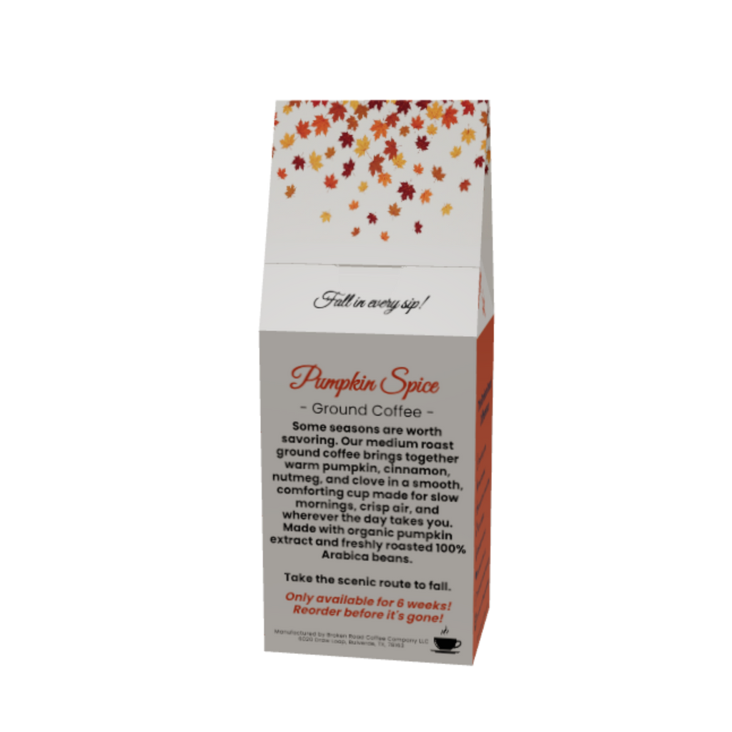 A paper coffee bag package labeled 'Pumpkin Spice Ground Coffee' with a white body, orange side panels, and a multicolor autumn leaf pattern near the top, shown on a plain white background.