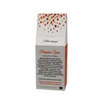 A paper coffee bag package labeled 'Pumpkin Spice Ground Coffee' with a white body, orange side panels, and a multicolor autumn leaf pattern near the top, shown on a plain white background.