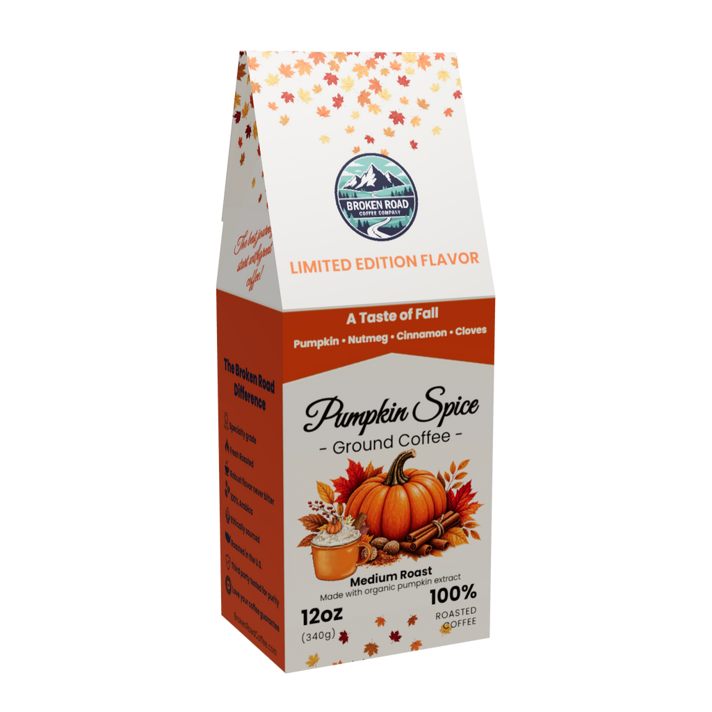 A package of Broken Road Coffee Company Pumpkin Spice Ground Coffee, featuring a white and orange bag with autumn-themed graphics including pumpkins, cinnamon sticks, and fall leaves.