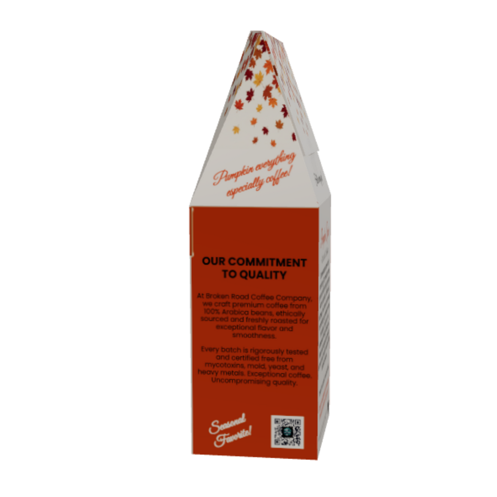 A tall, narrow pyramid-shaped Pumpkin Spice Coffee from broken road coffee company with a white top and a solid orange-brown lower section, featuring printed text and a small logo near the bottom, isolated on a white background.